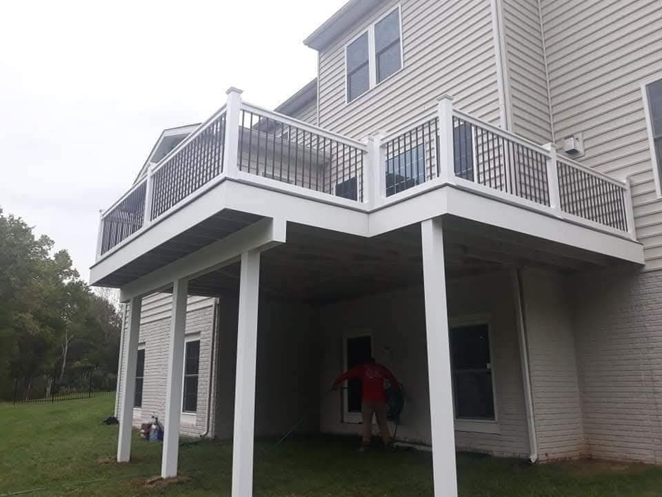 New white and black composite elevated deck after construction in Ashburn VA