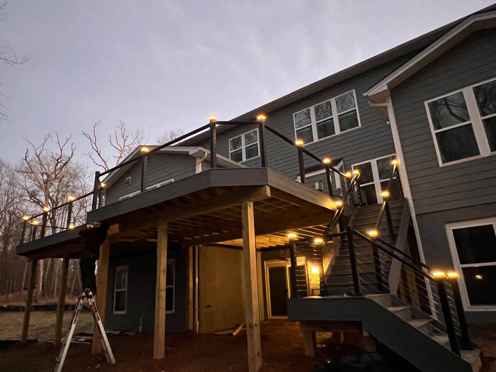 Elevated composite deck on a wooded Broadlands lot in Ashburn, Virginia